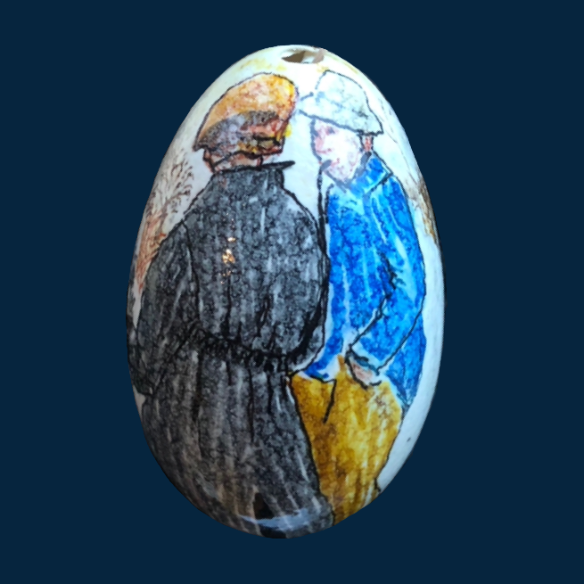 Dekoreret gåseæg på mørk kobolt blå bund. Motivet på ægget er inspireret af et vinterbillede af L.A.Ring med titlen "Maleren i landsbyen"